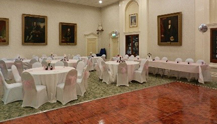 Tables set for a wedding reception at Southampton Masonic Hall